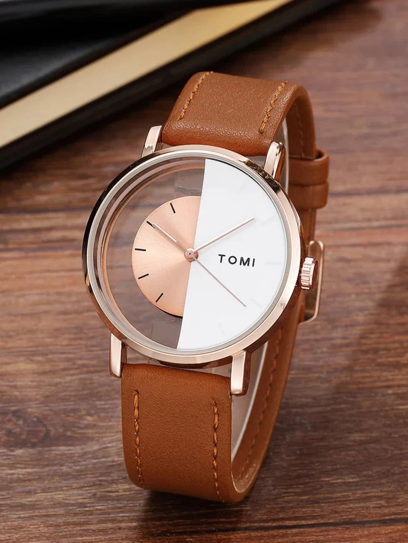 Relógio de quartzo com design oco simples da moda TOMI