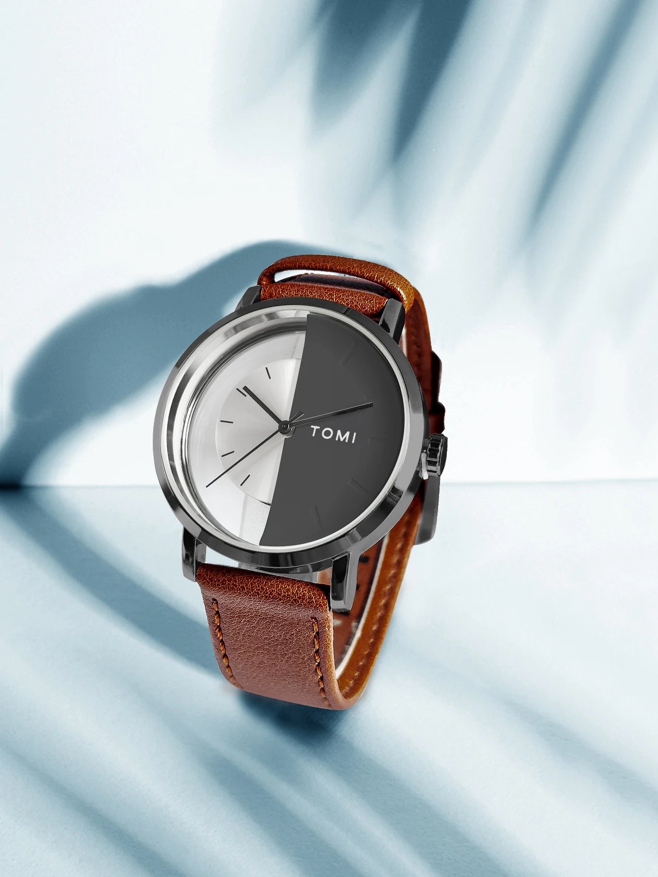 Relógio de quartzo com design oco simples da moda TOMI